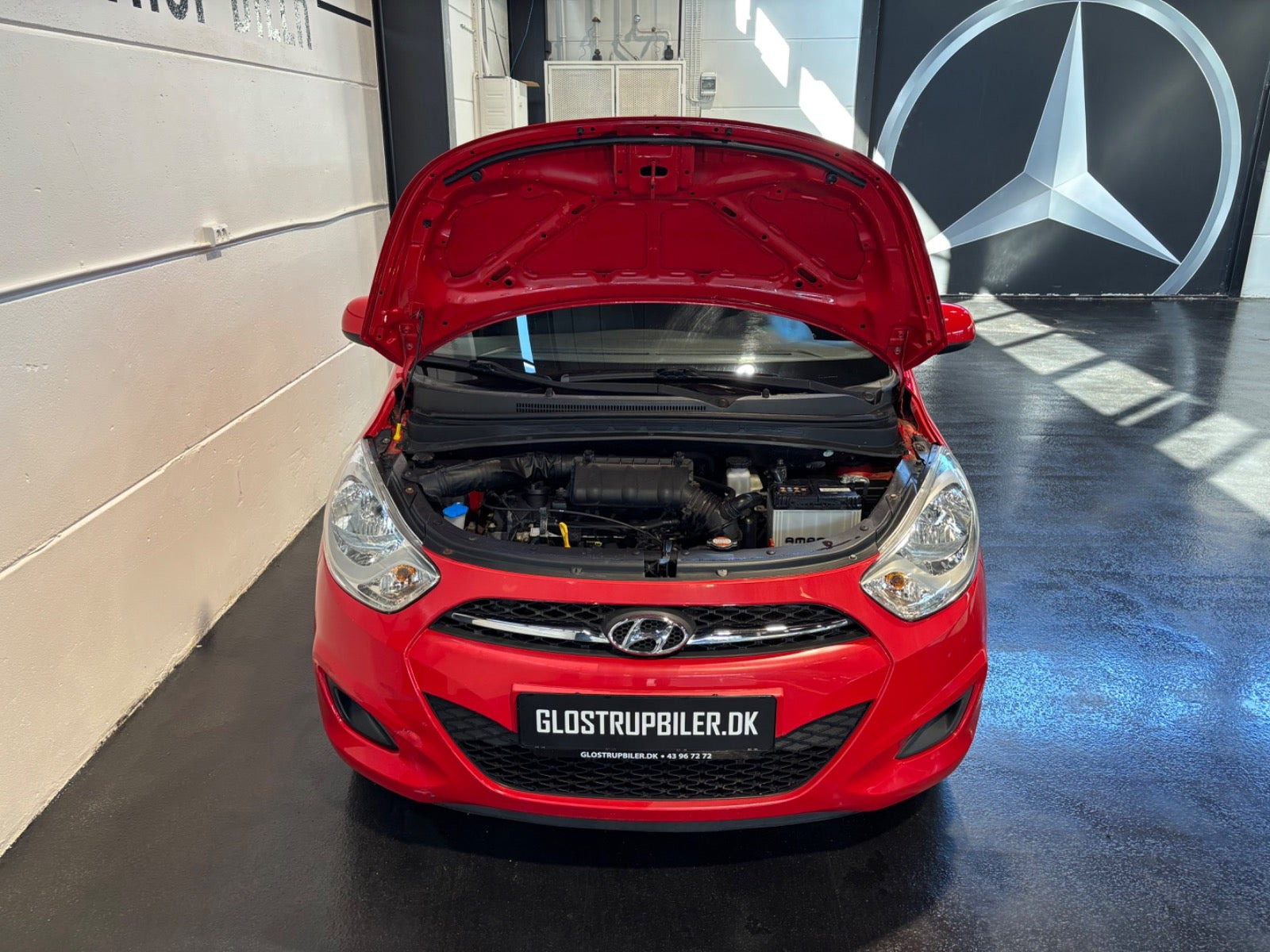 Rød Hyundai i10 fra 2011