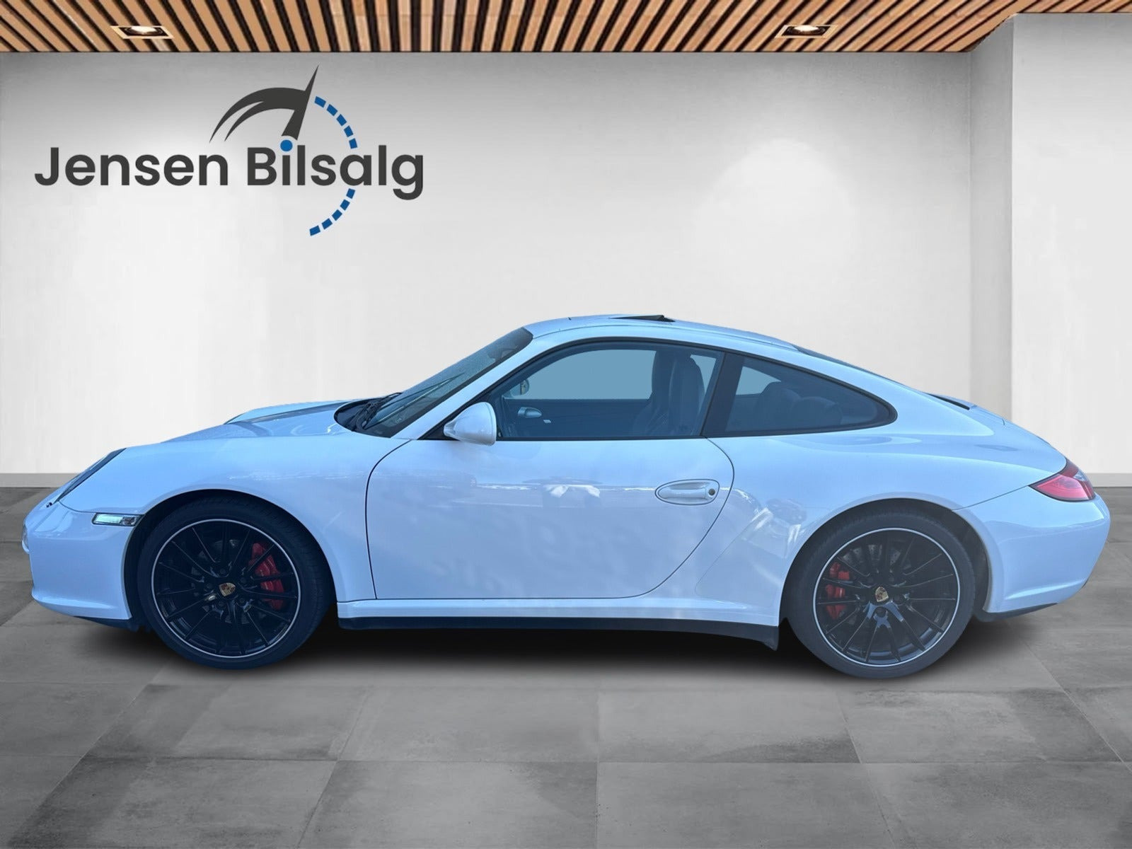Gul Porsche 911 Carrera 4S fra 2009