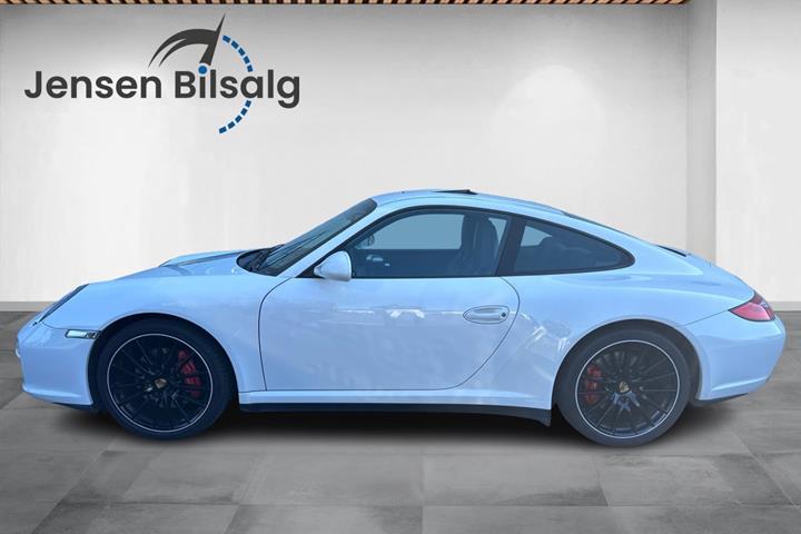 Gul Porsche 911 Carrera 4S fra 2009