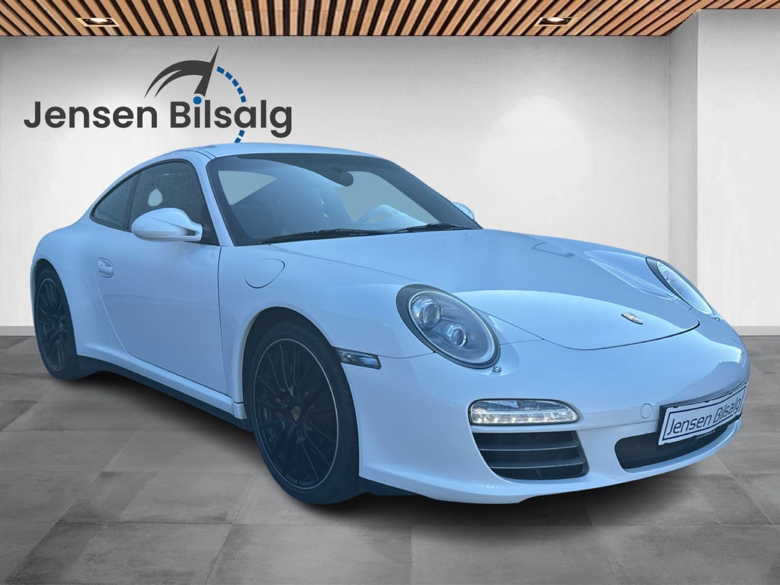 Gul Porsche 911 Carrera 4S fra 2009