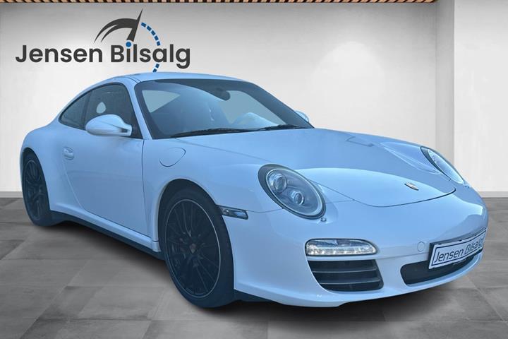 Gul Porsche 911 Carrera 4S fra 2009