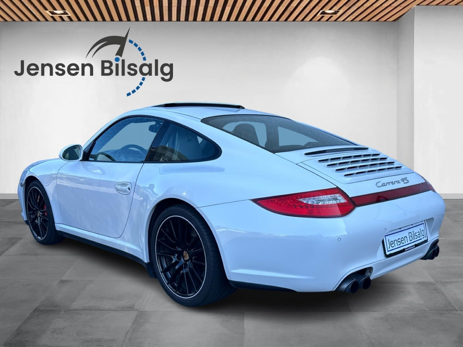 Gul Porsche 911 Carrera 4S fra 2009