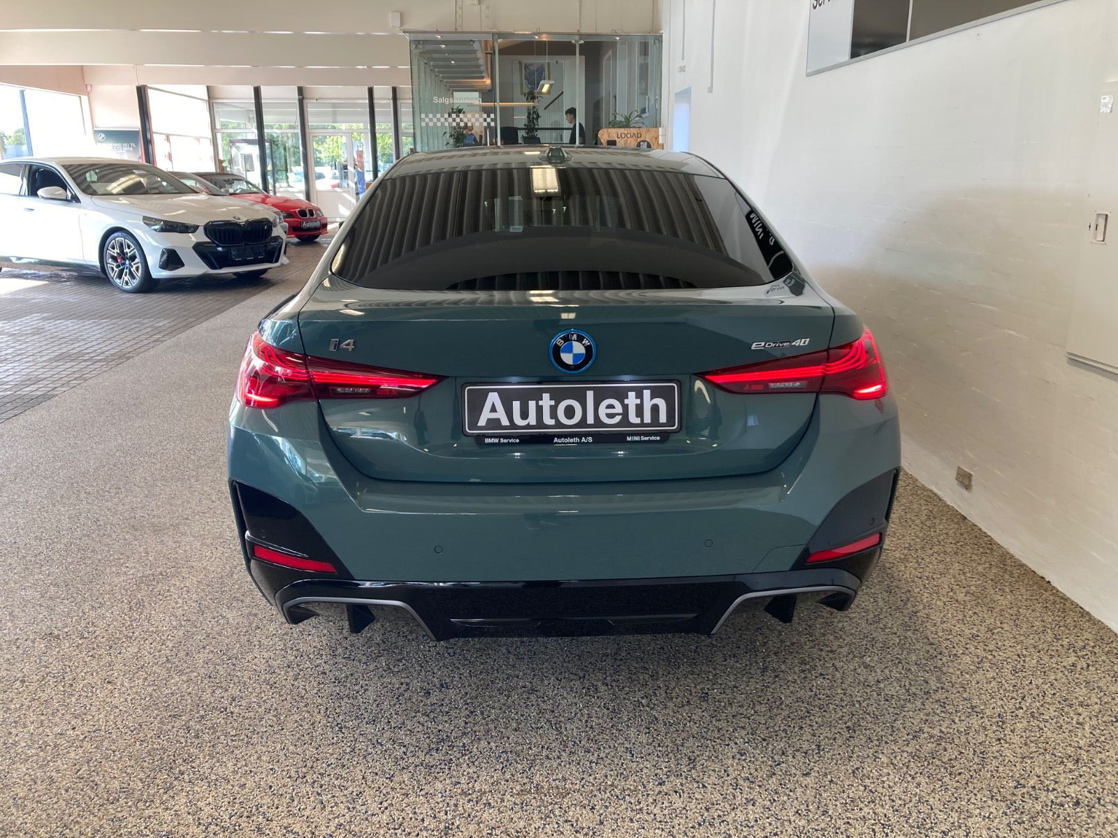 Grøn BMW i4 fra 2025
