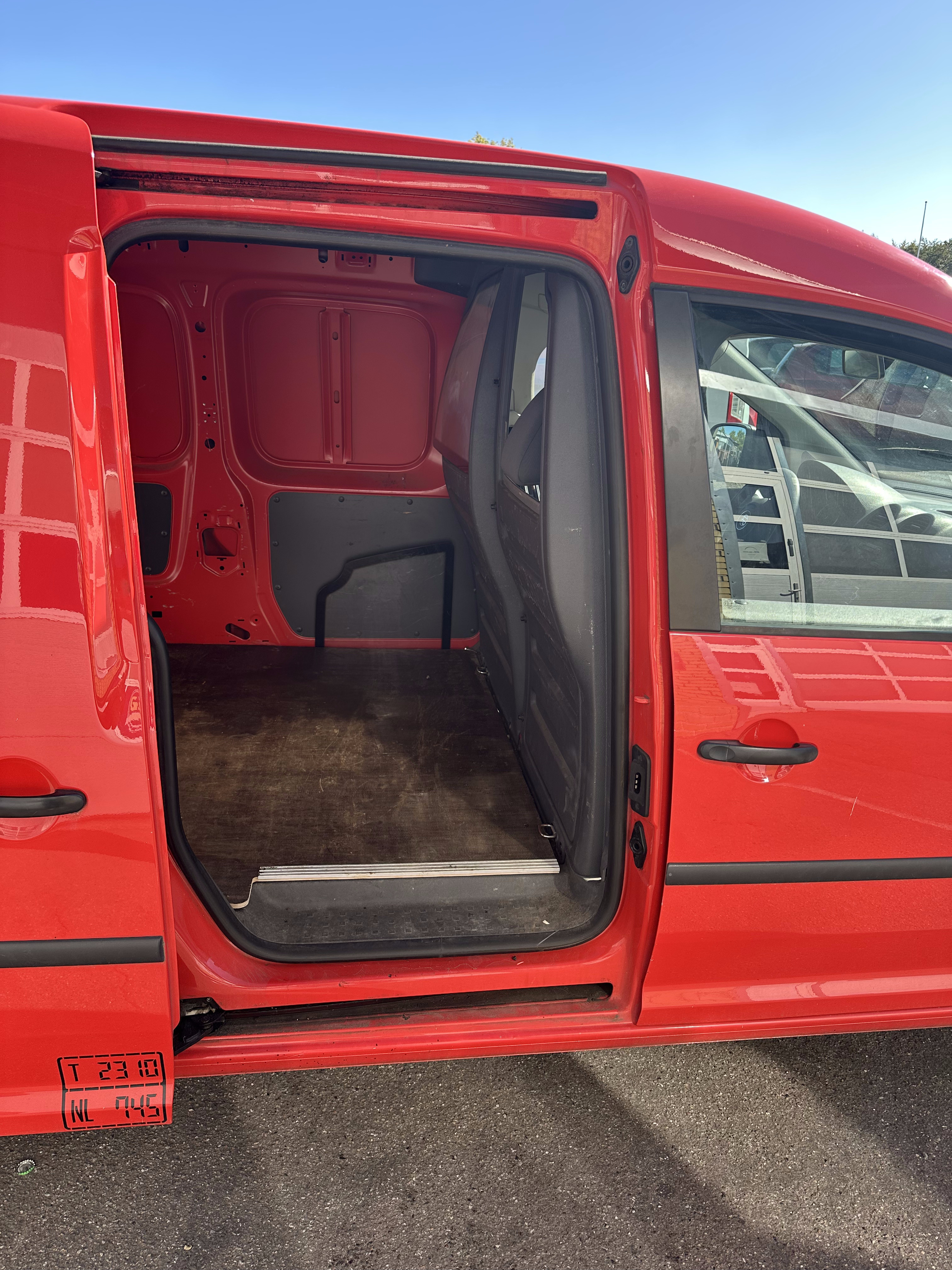Rød VW Caddy fra 2014
