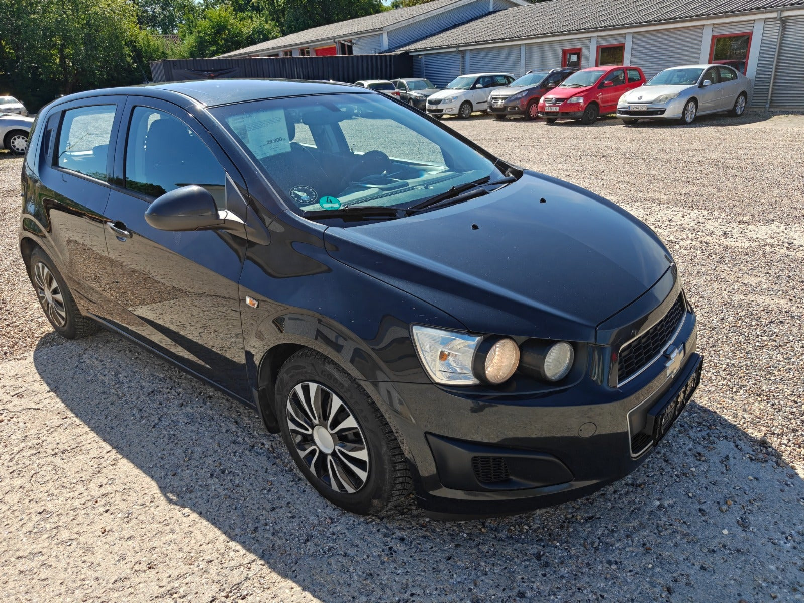 Gul Chevrolet Aveo fra 2013