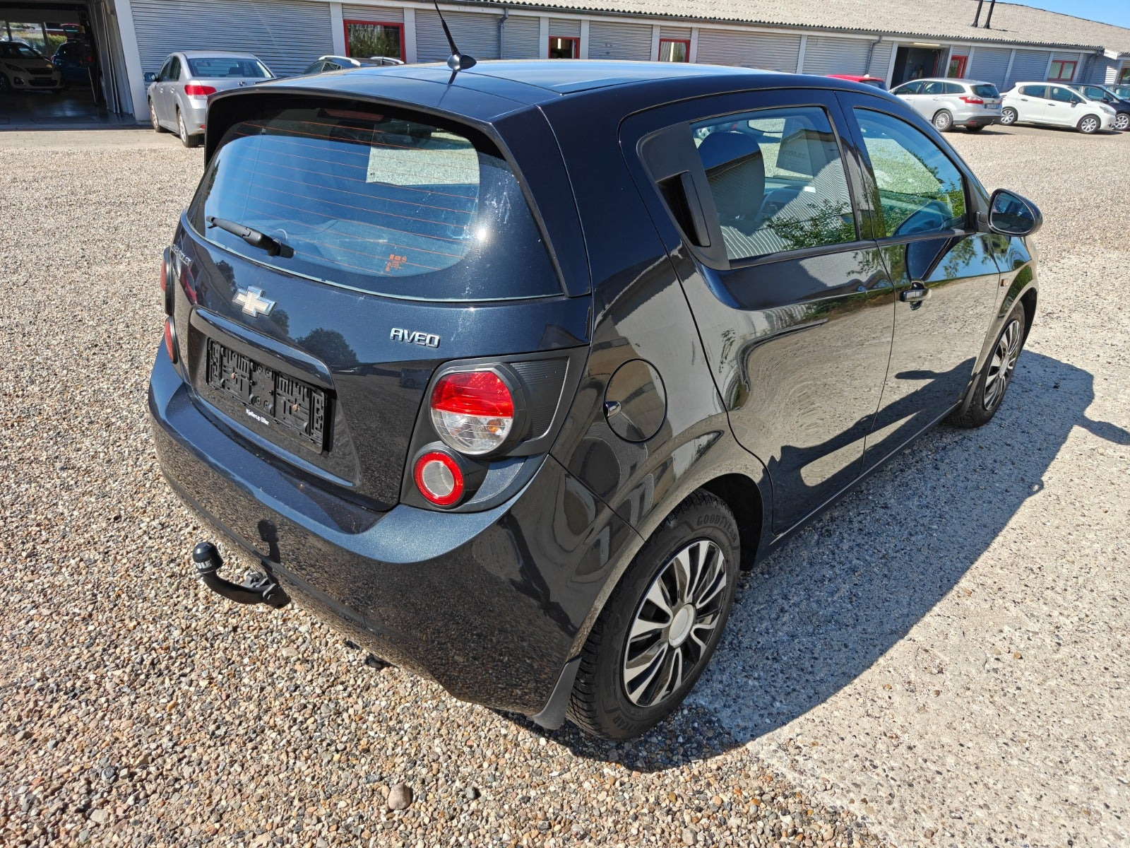Gul Chevrolet Aveo fra 2013