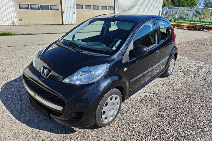 Gul Peugeot 107 fra 2010