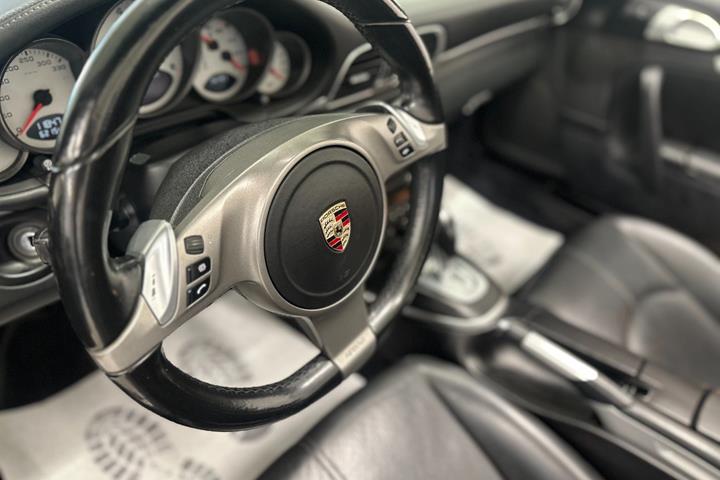 Sort Porsche 911 Carrera 4S fra 2009