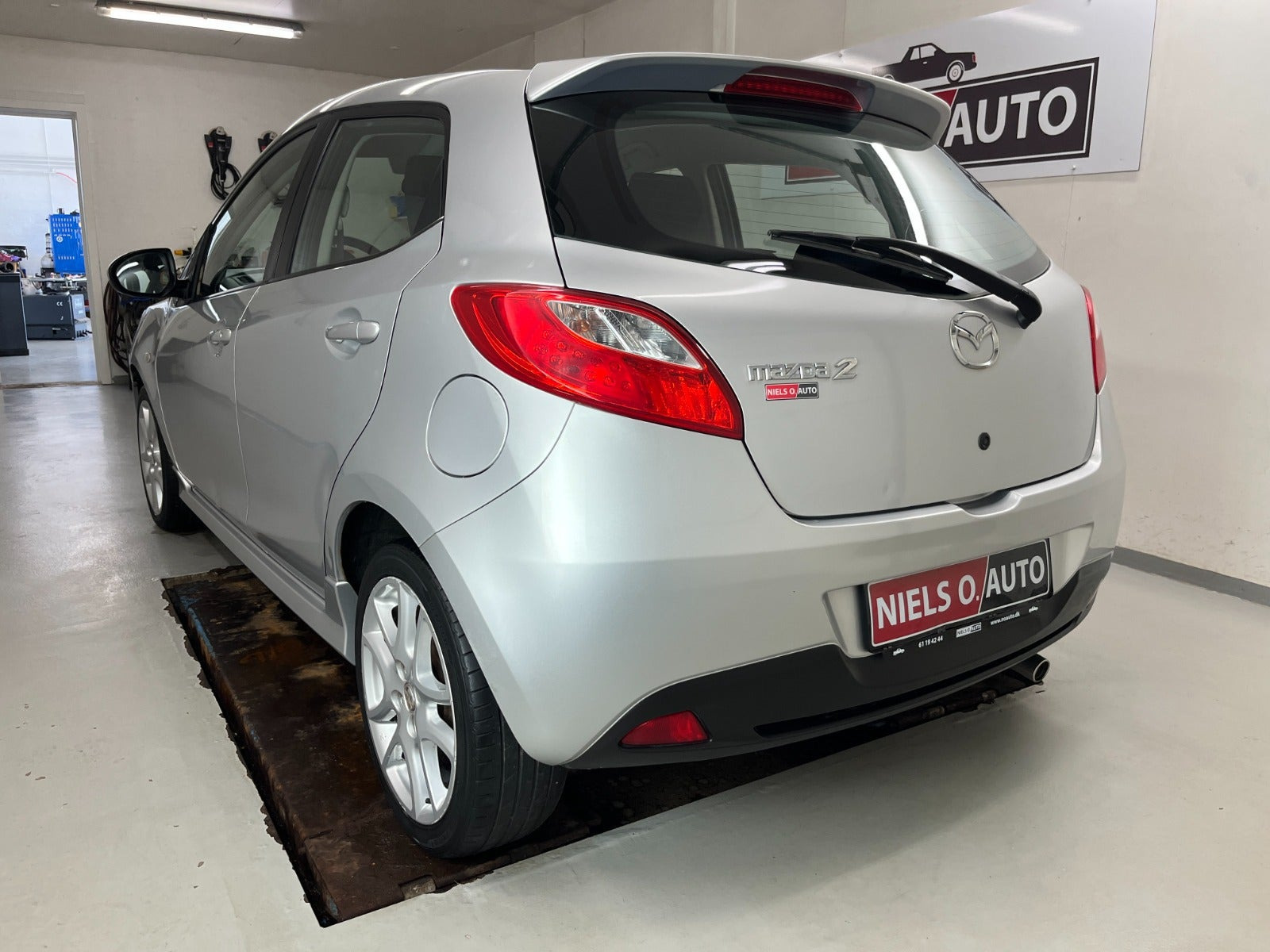 Sølv Mazda 2 fra 2012
