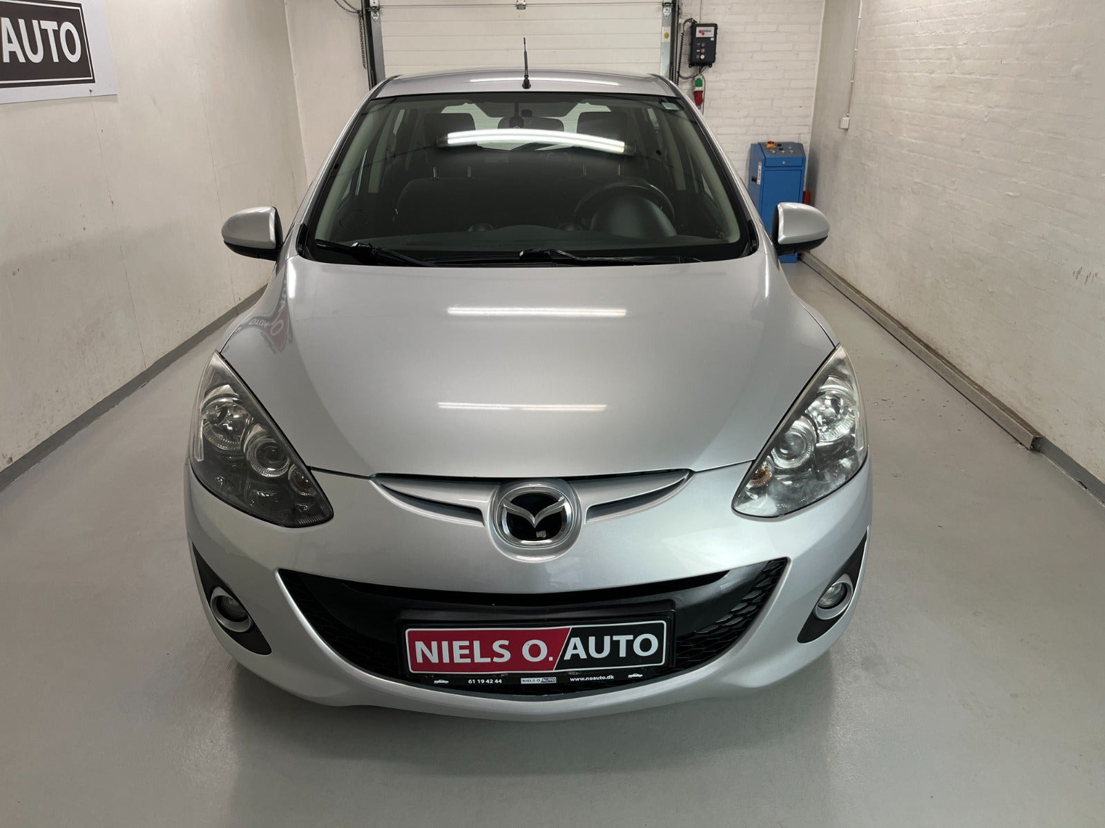 Sølv Mazda 2 fra 2012