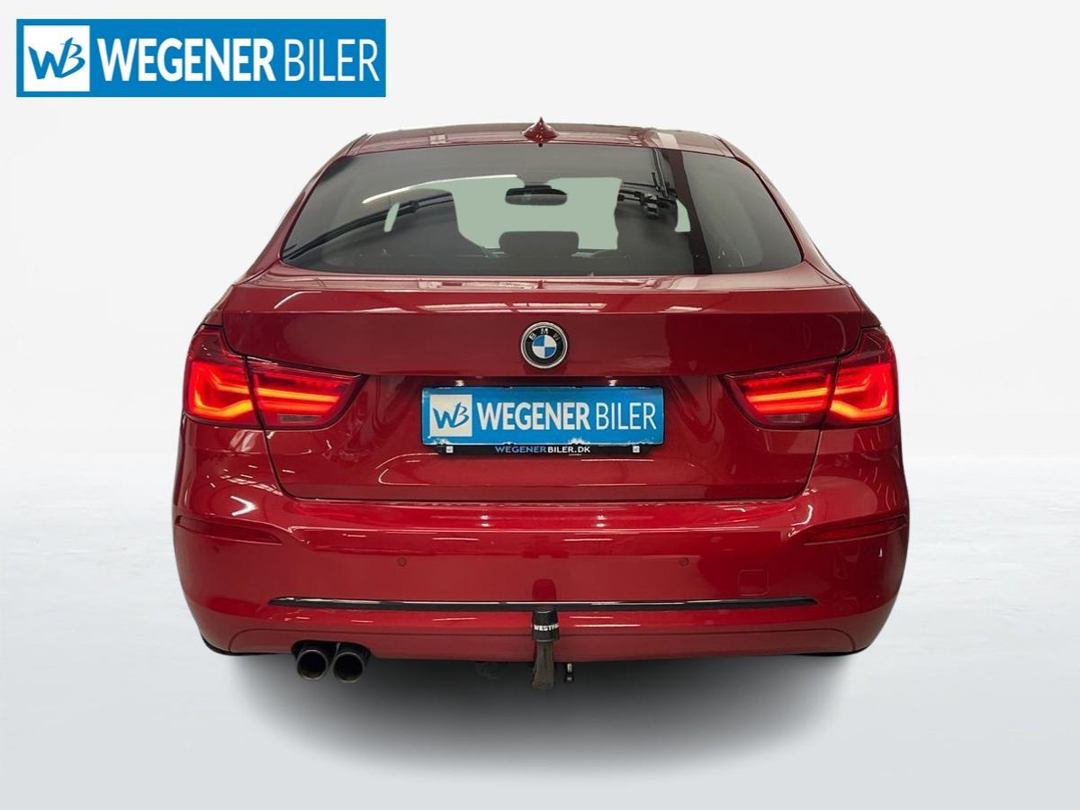 Rød BMW 320d fra 2017