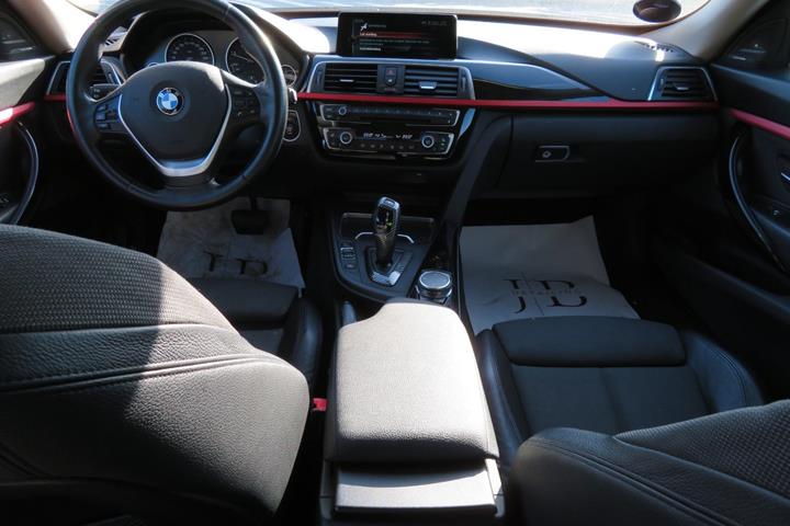 Grå BMW 320d fra 2016