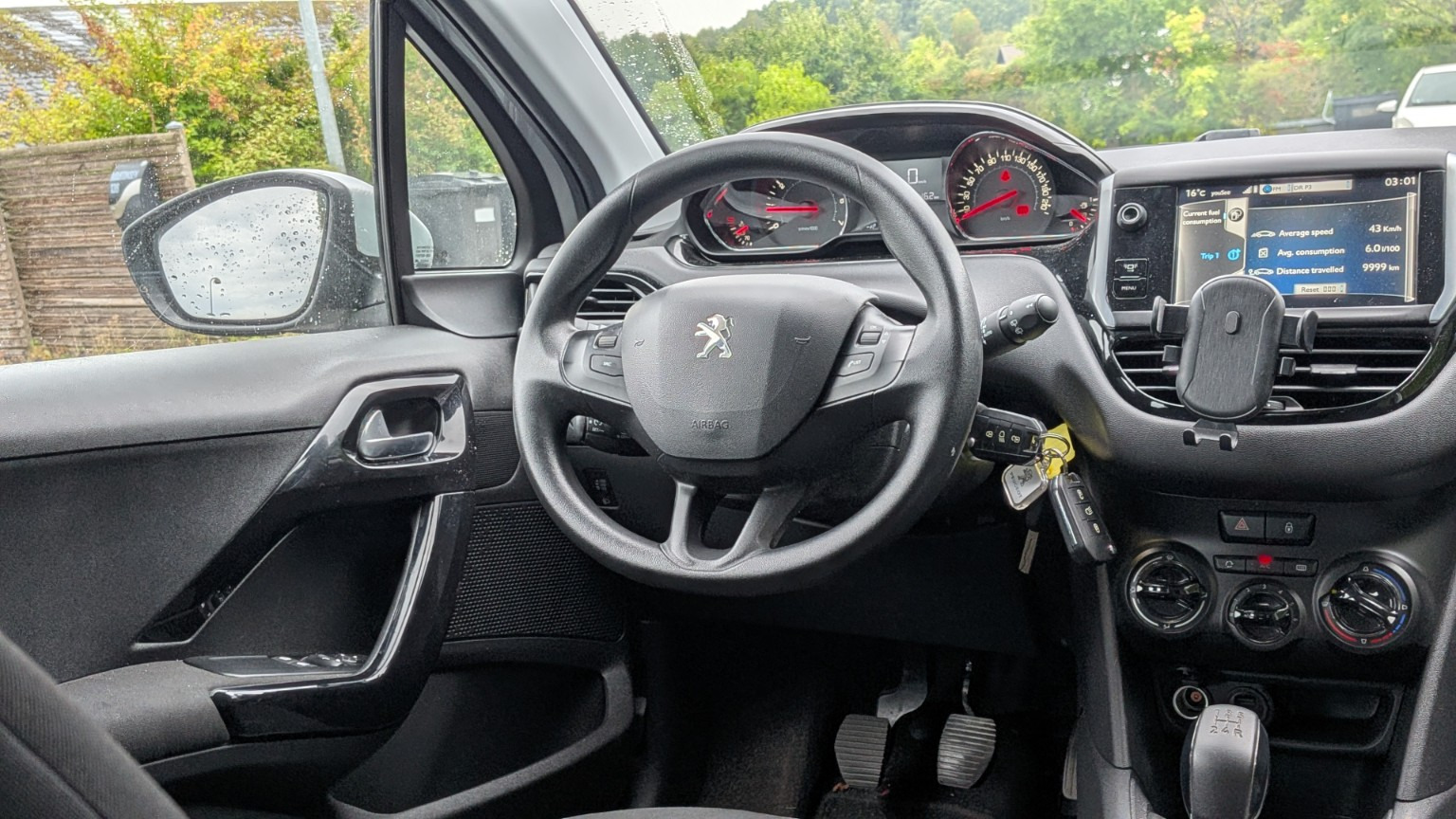 Sølv Peugeot 208 fra 2013
