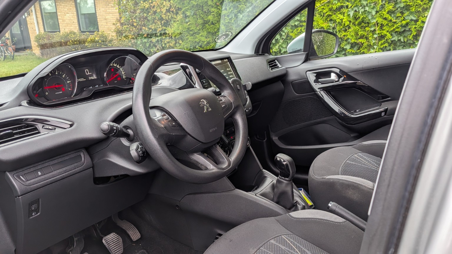 Sølv Peugeot 208 fra 2013
