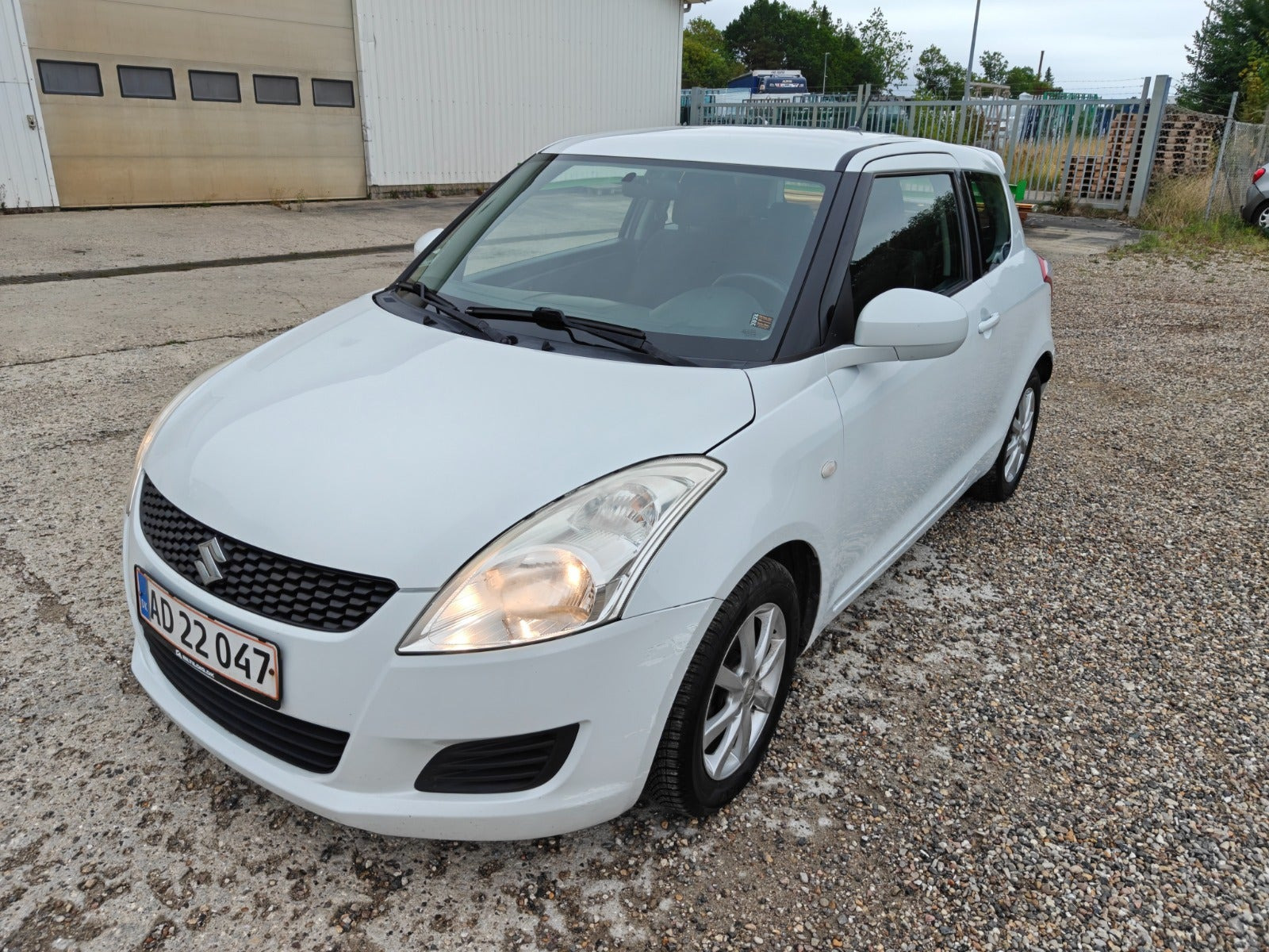 Gul Suzuki Swift fra 2012