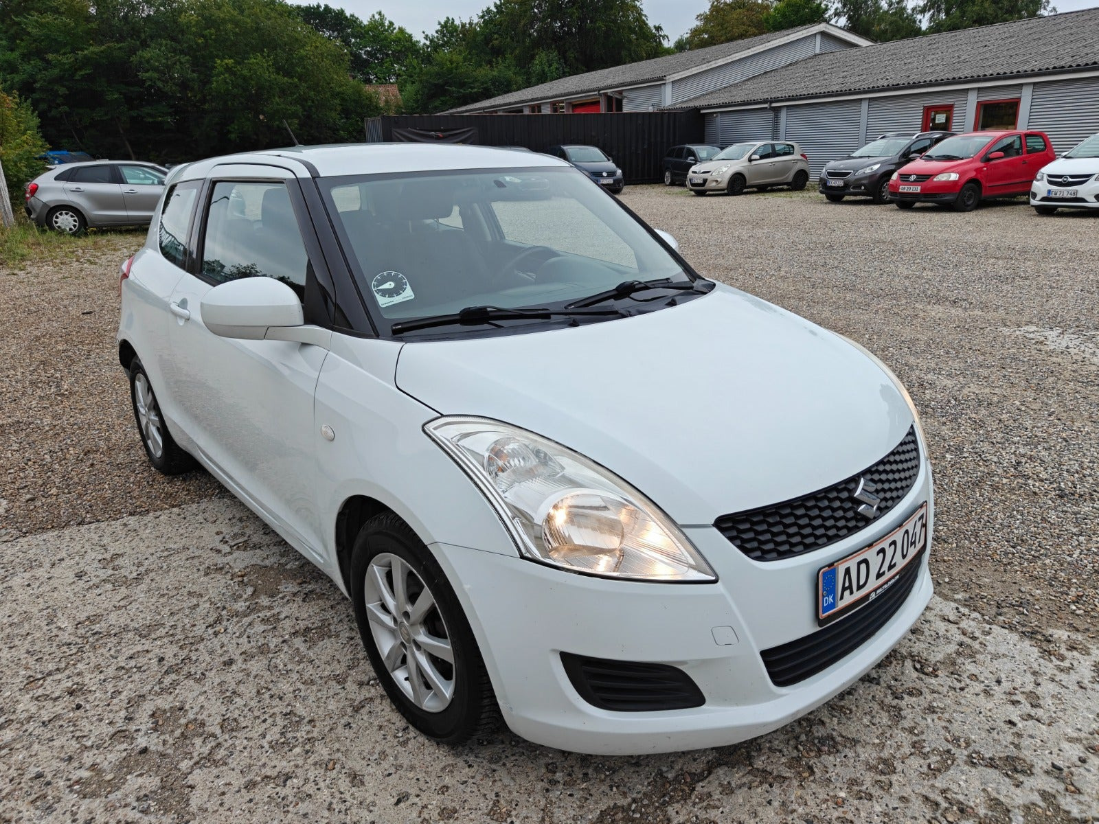 Gul Suzuki Swift fra 2012