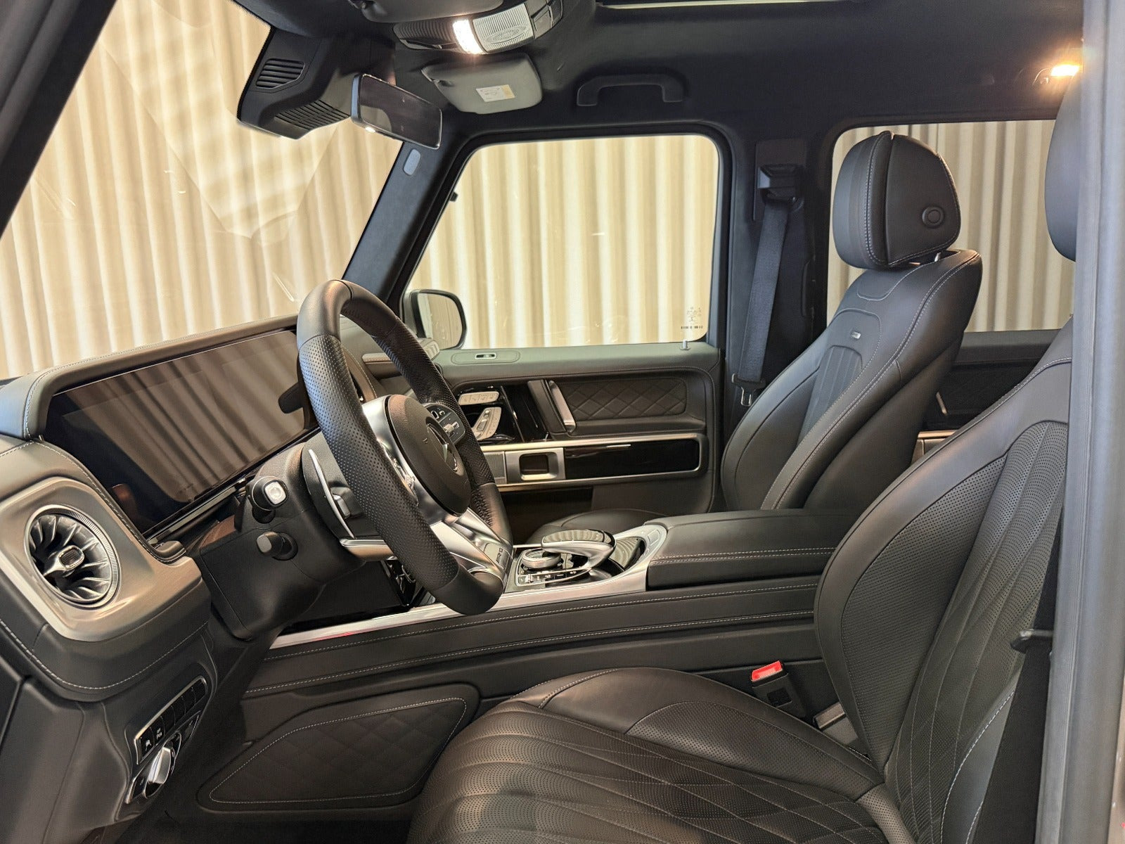 Grå Mercedes G63 fra 2020