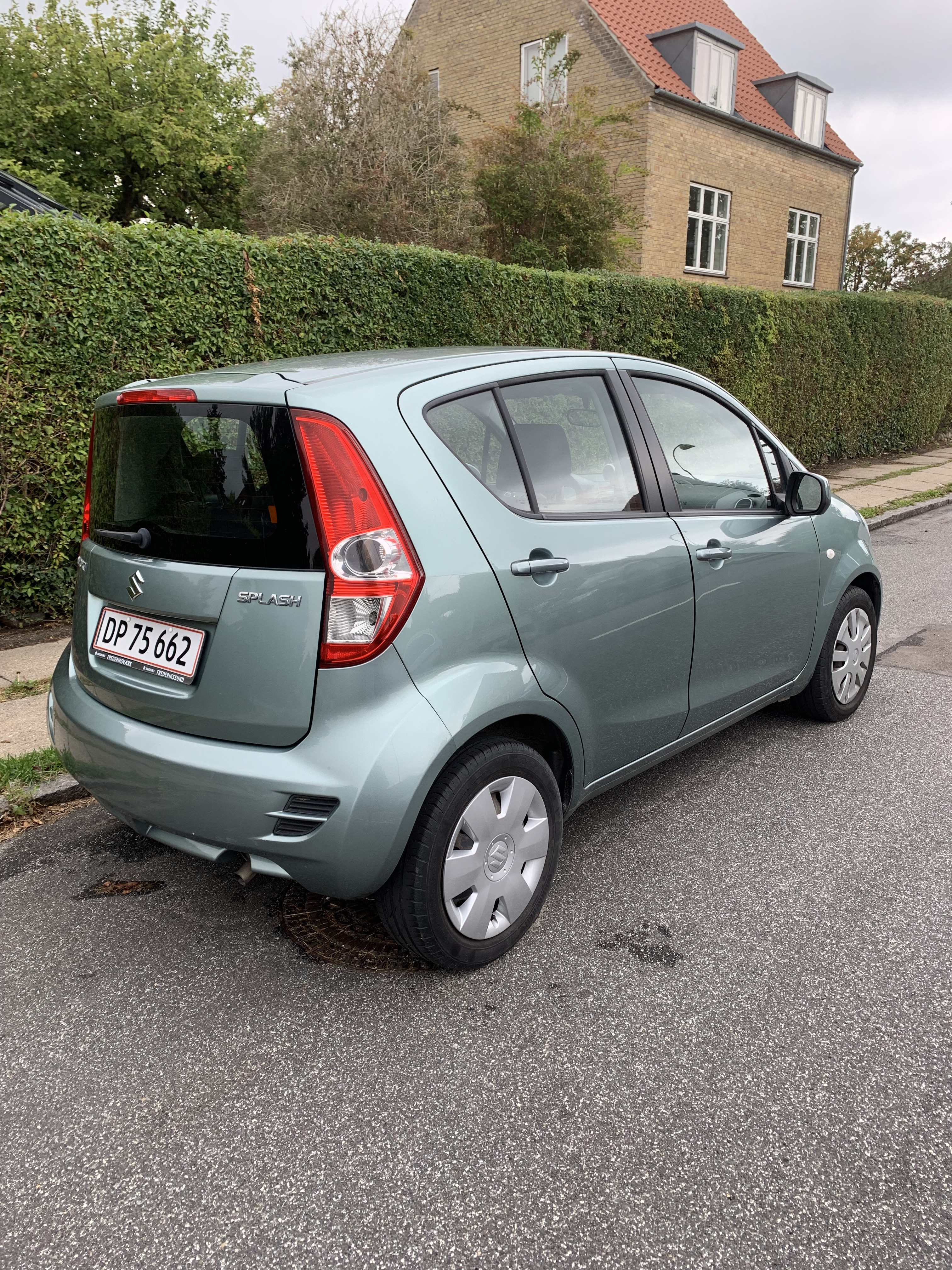 Grøn Suzuki Splash fra 2013