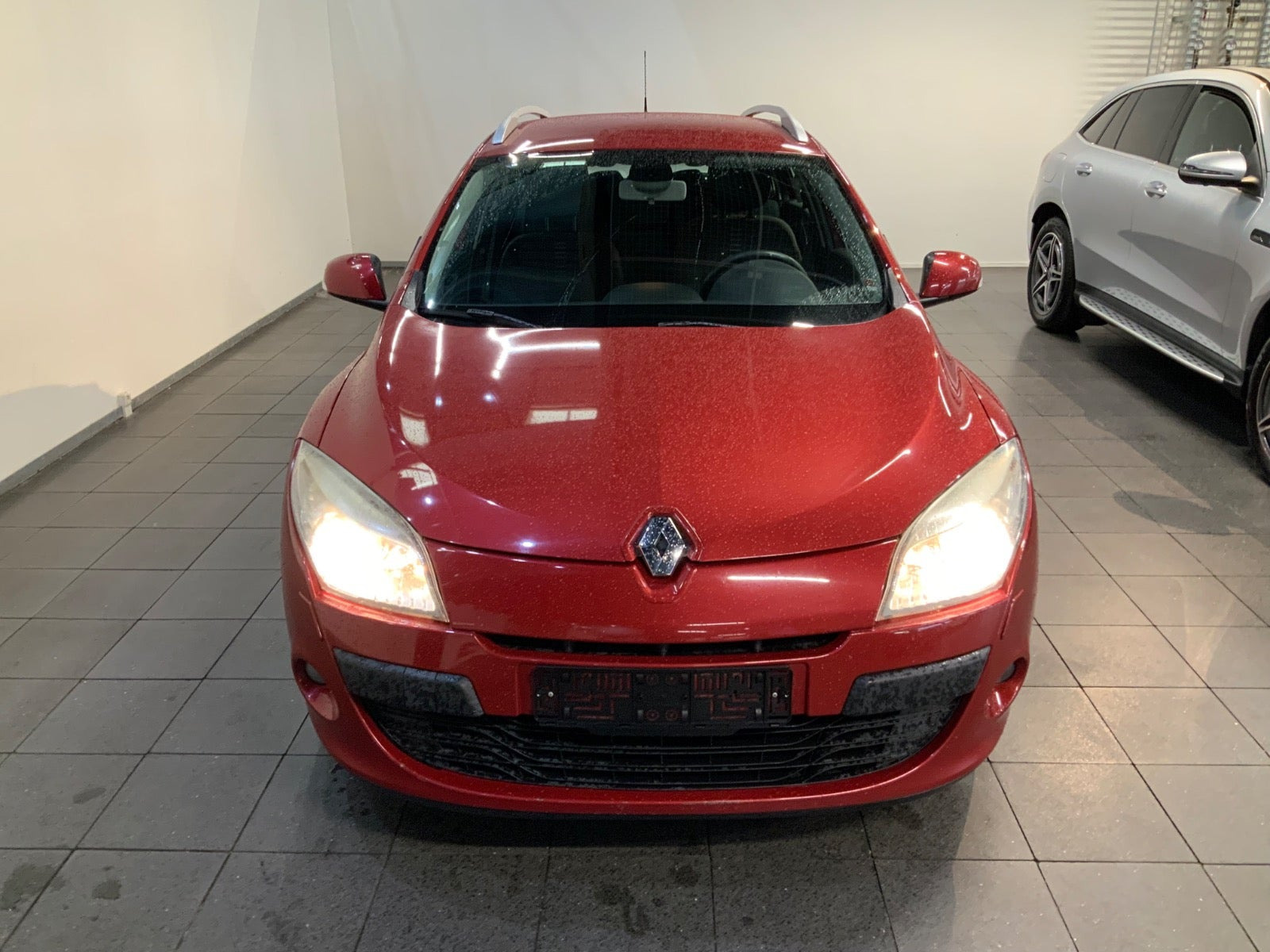 Rød Renault Megane III fra 2010