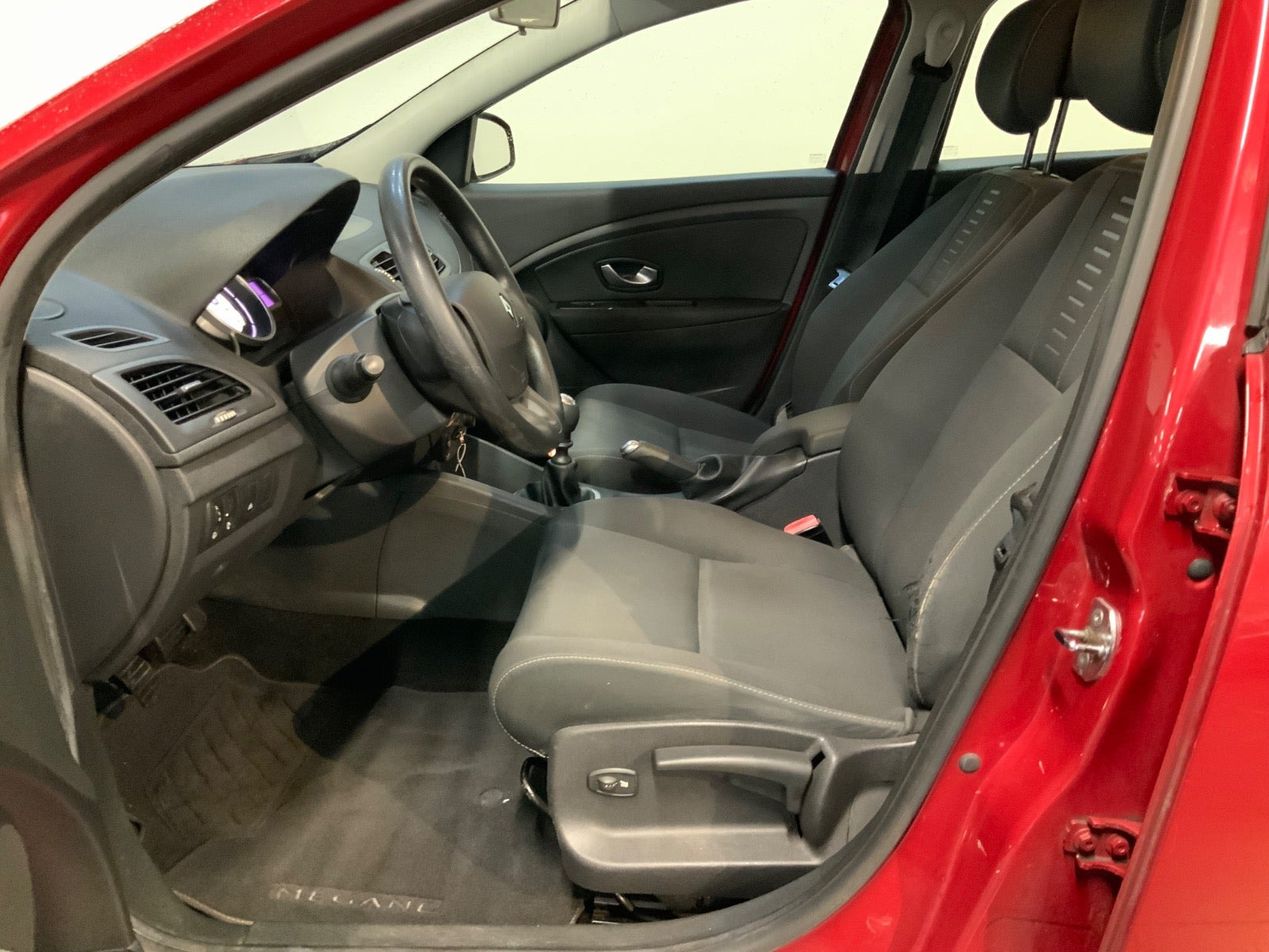 Rød Renault Megane III fra 2010