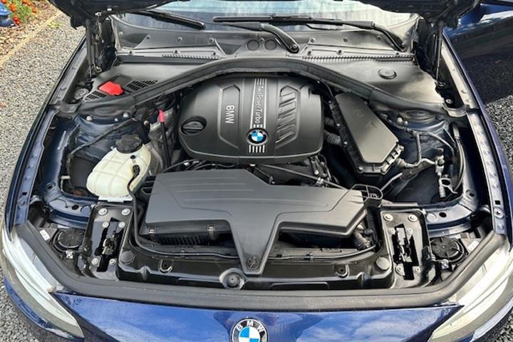 Blå BMW 120d fra 2012