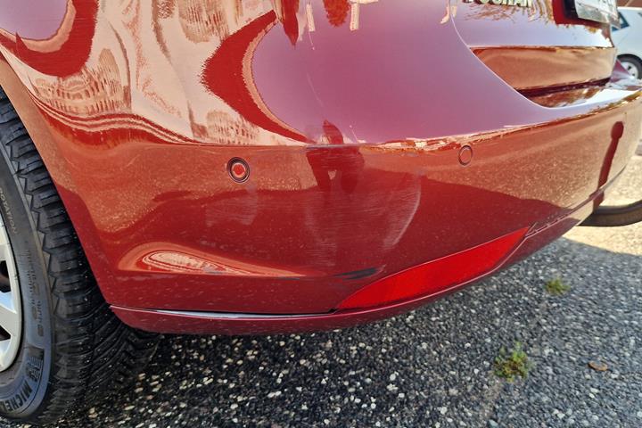 Rød VW Touran fra 2014
