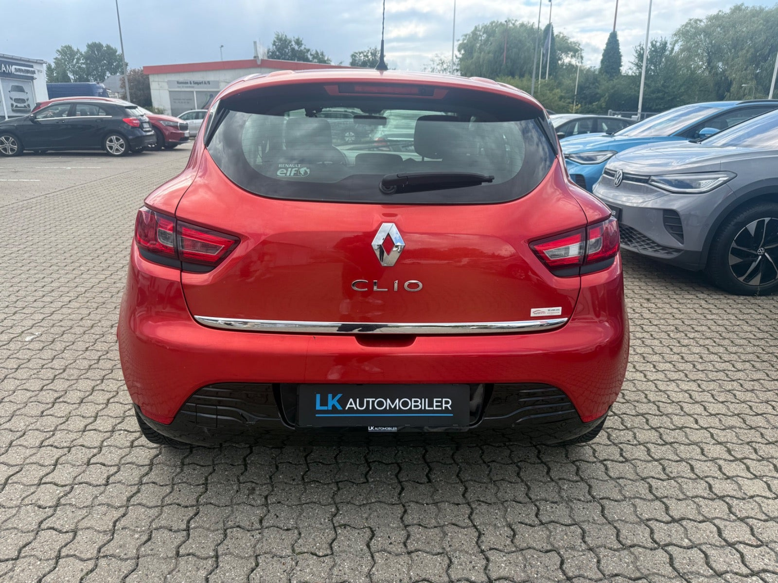 Rød Renault Clio IV fra 2013