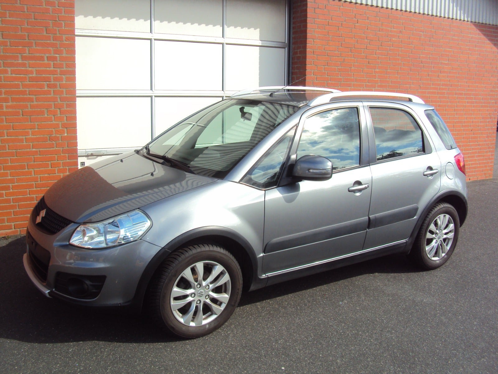 Grå Suzuki SX4 fra 2015