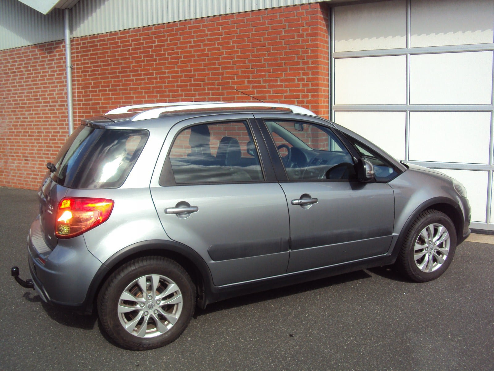 Grå Suzuki SX4 fra 2015