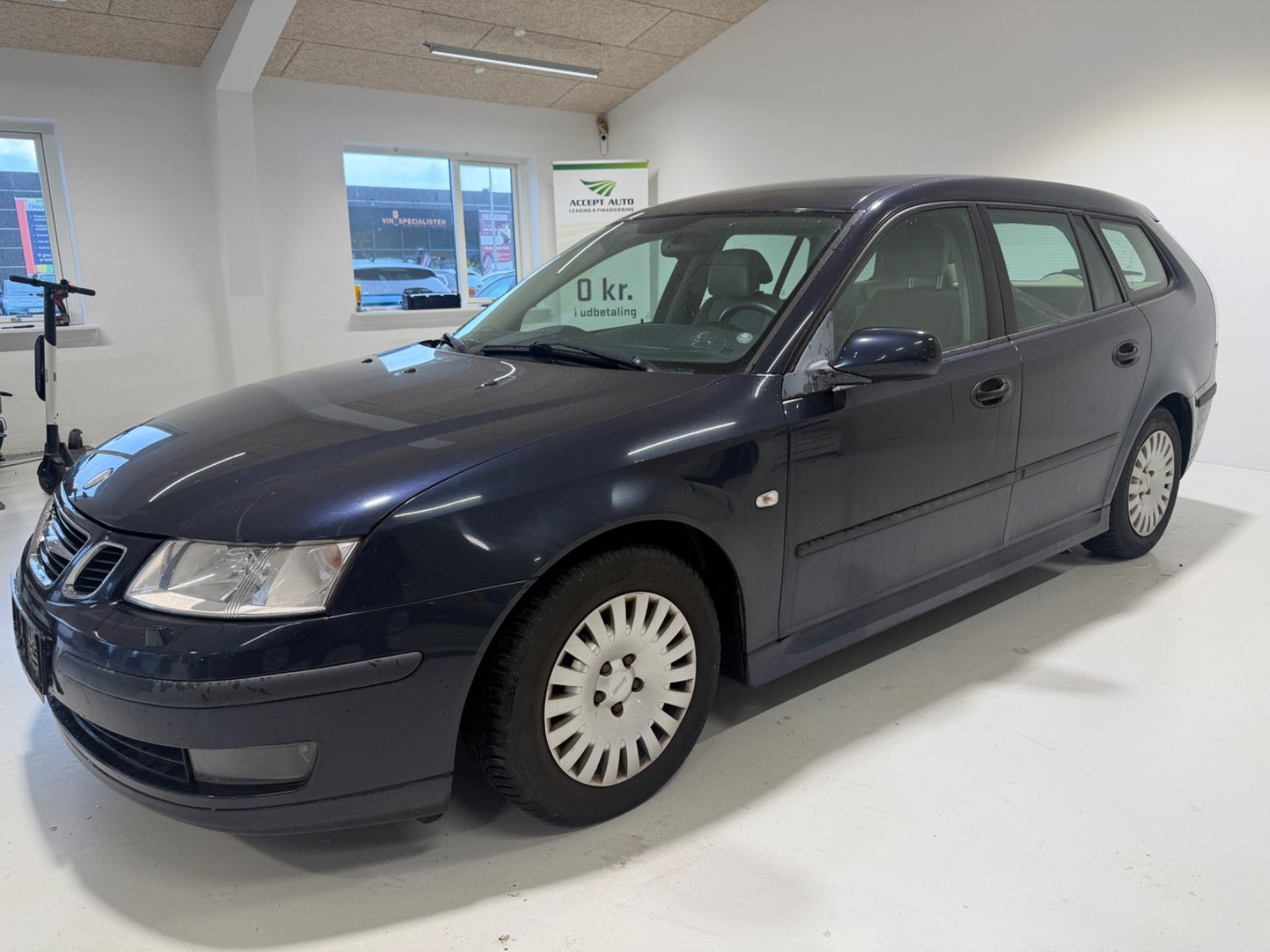 Blå Saab 9-3 fra 2006
