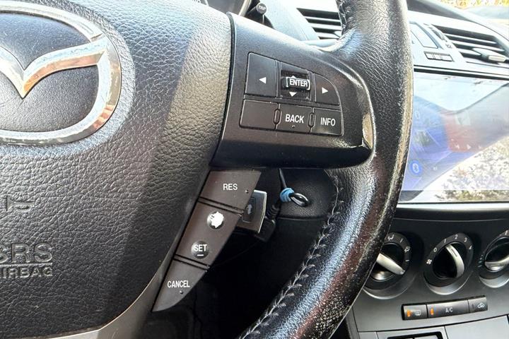Grøn Mazda 3 fra 2011
