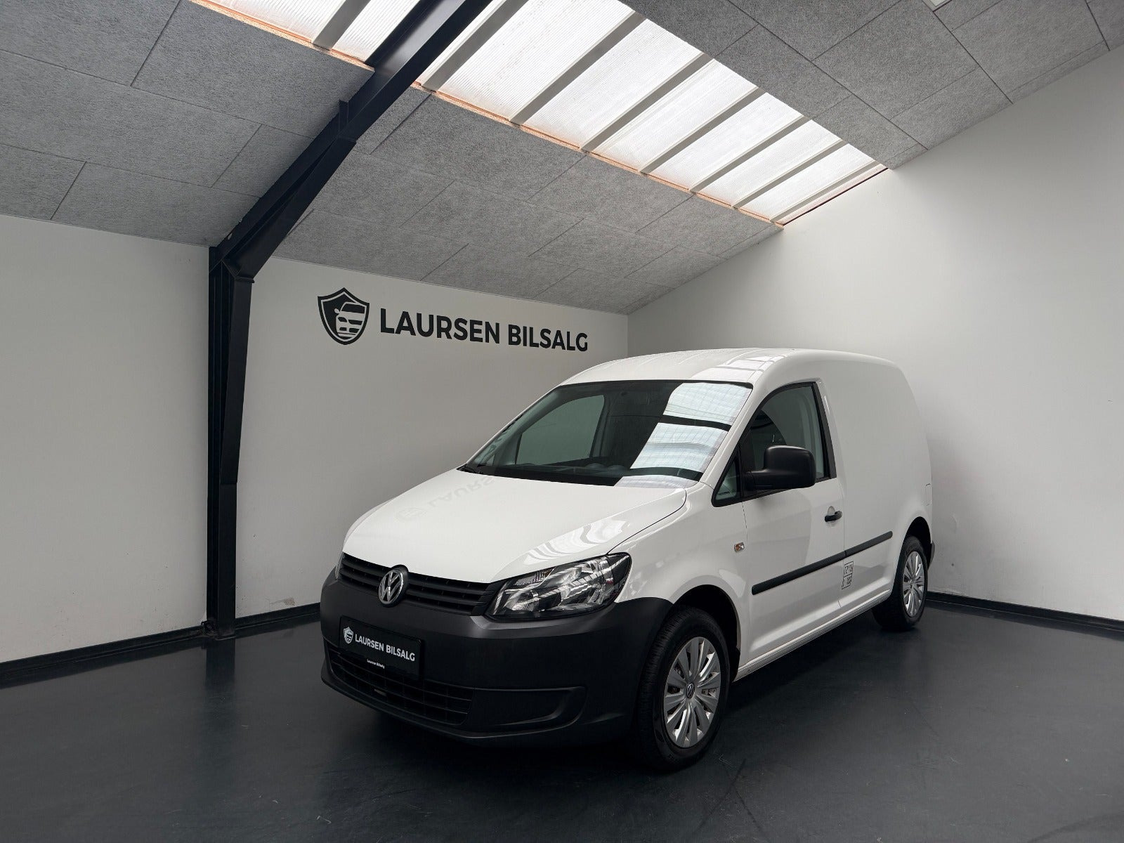 Hvid VW Caddy fra 2012