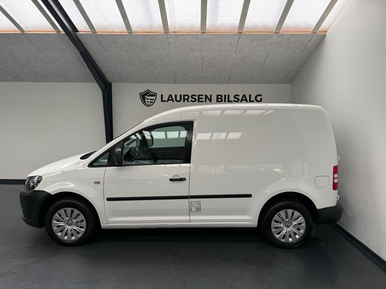 Hvid VW Caddy fra 2012