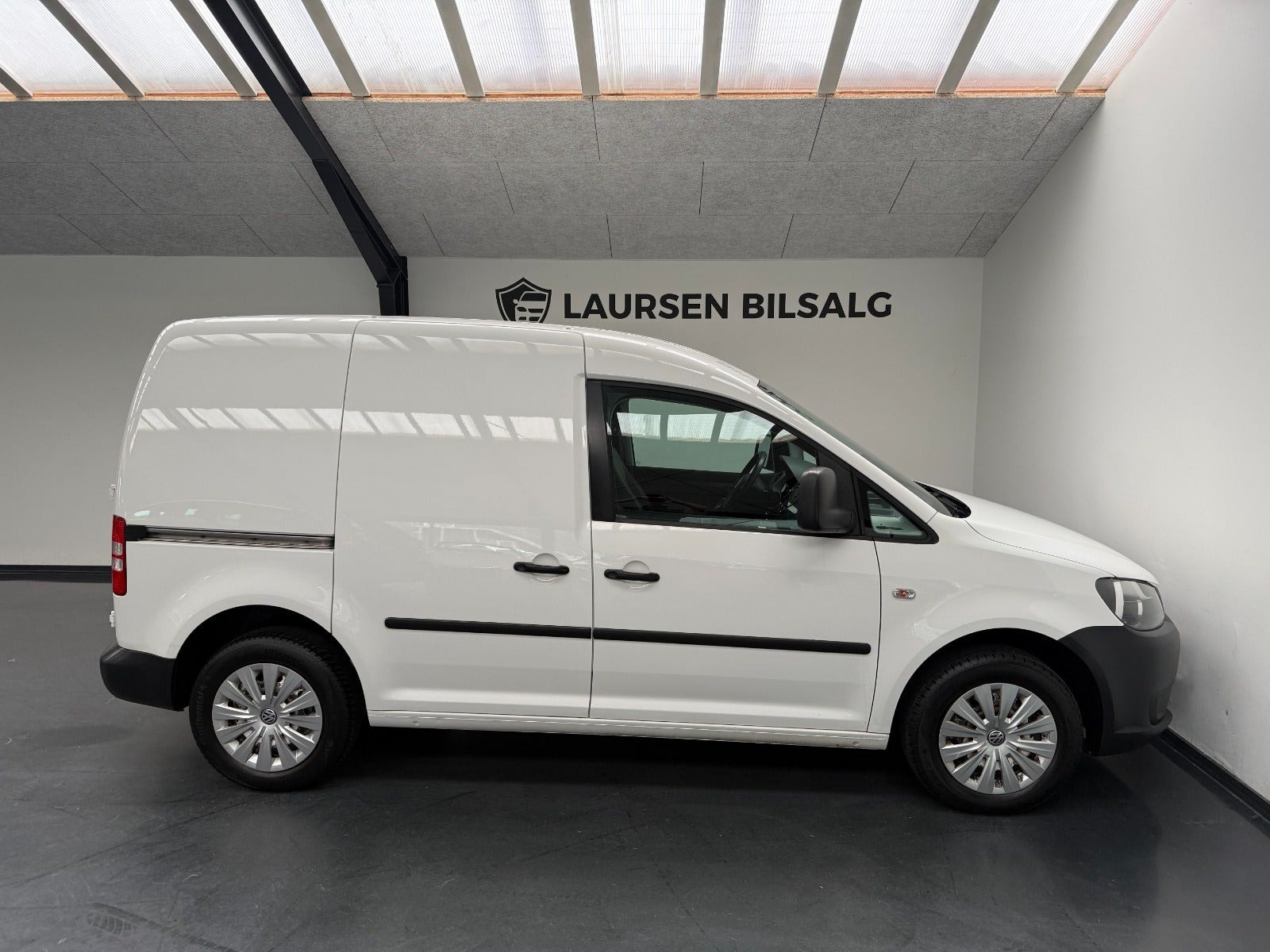 Hvid VW Caddy fra 2012