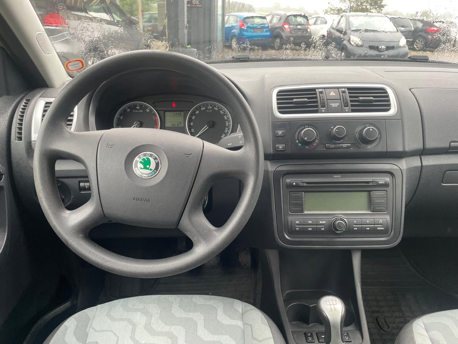 Orange Skoda Fabia fra 2008