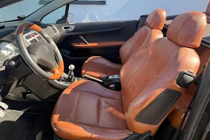 Grøn Peugeot 307 fra 2004