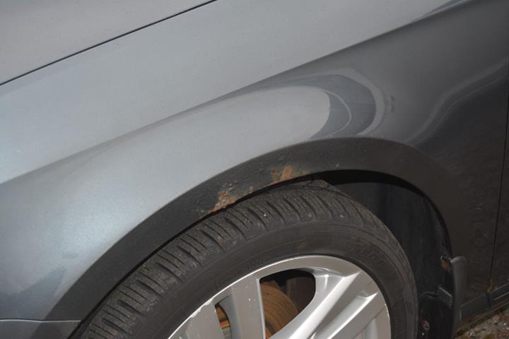 Grå VW Passat fra 2011