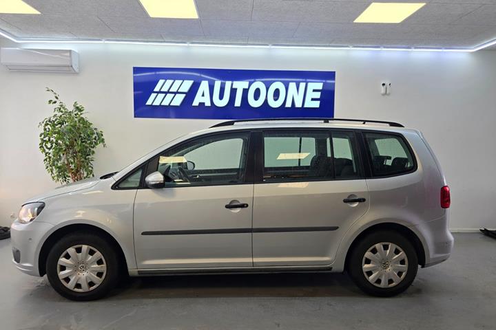 Sølv VW Touran fra 2011
