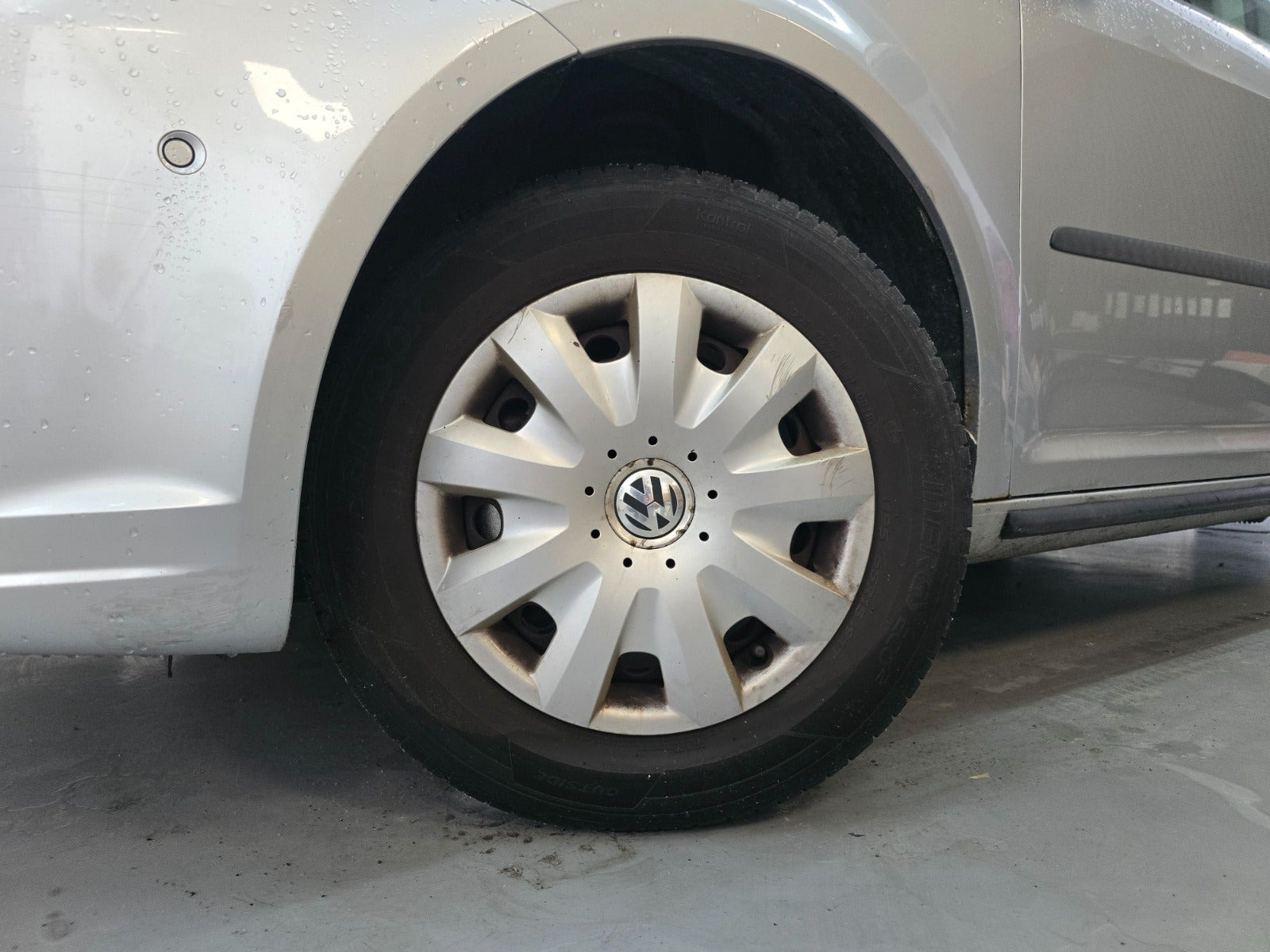 Sølv VW Touran fra 2011