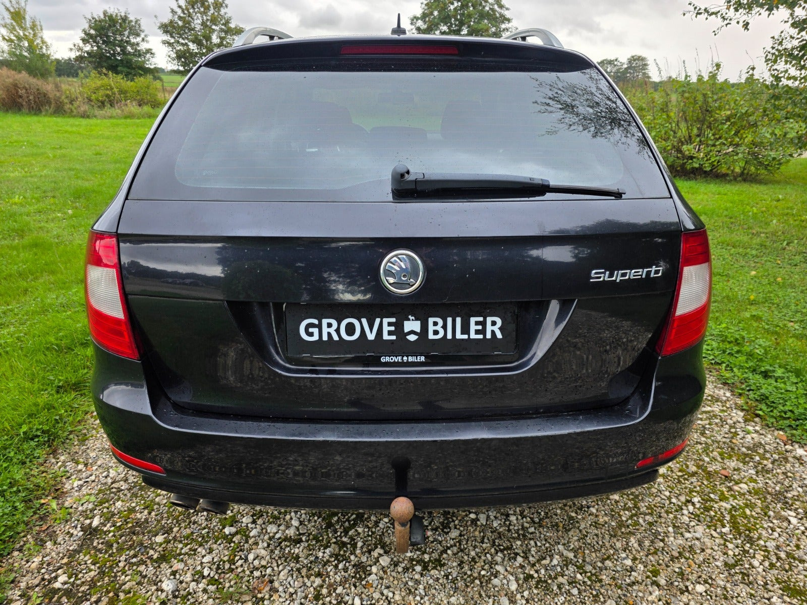 Gul Skoda Superb fra 2011