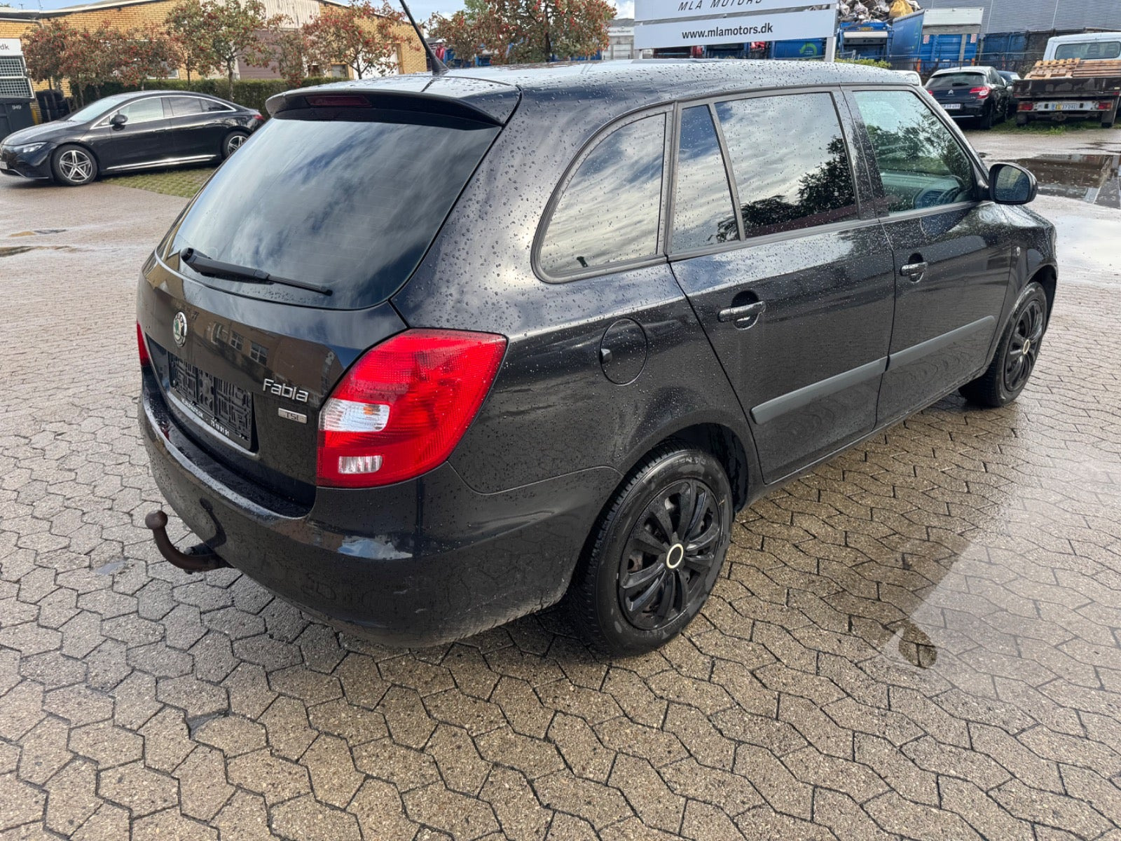Rød Skoda Fabia fra 2012