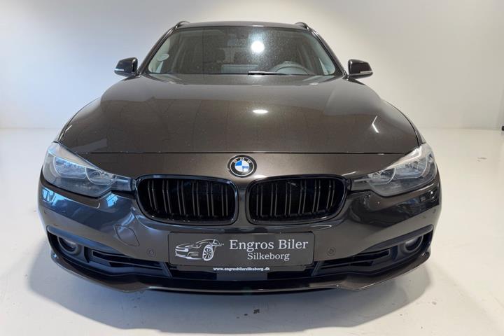 Brun BMW 320i fra 2017