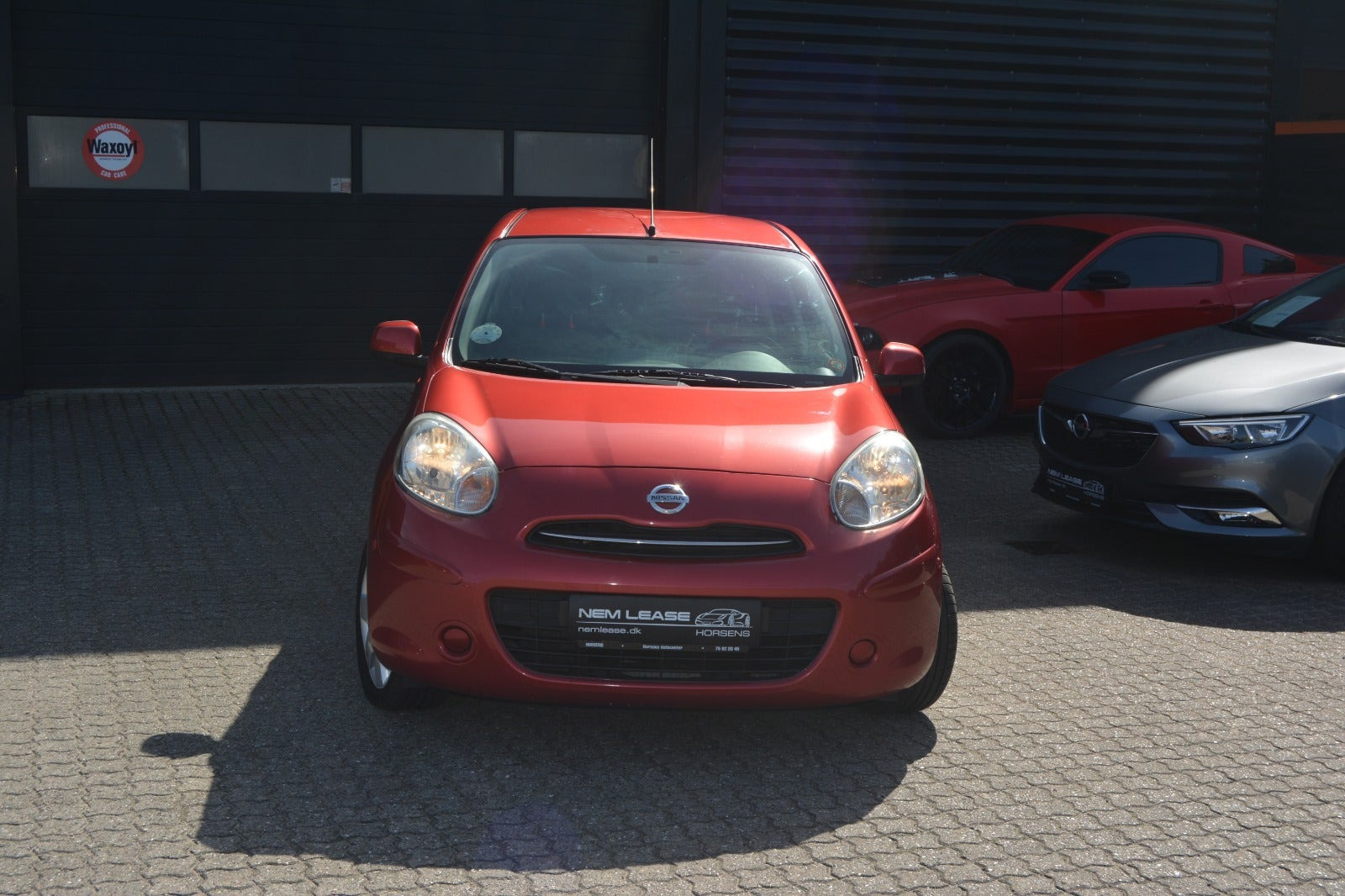 Rød Nissan Micra fra 2011