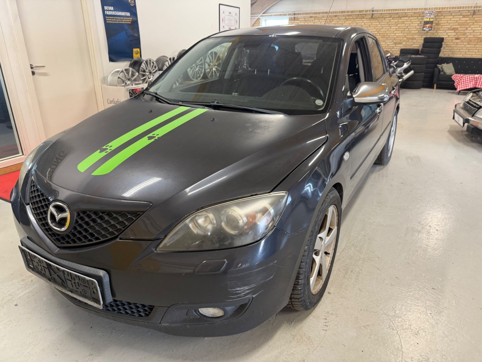 Mazda 3 1,6 Touring+ aut.