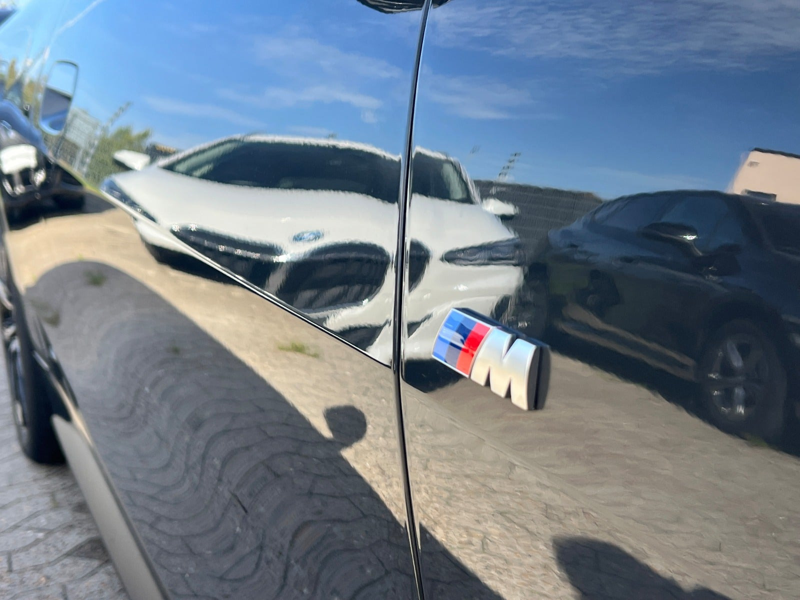 Grå BMW i4 fra 2026