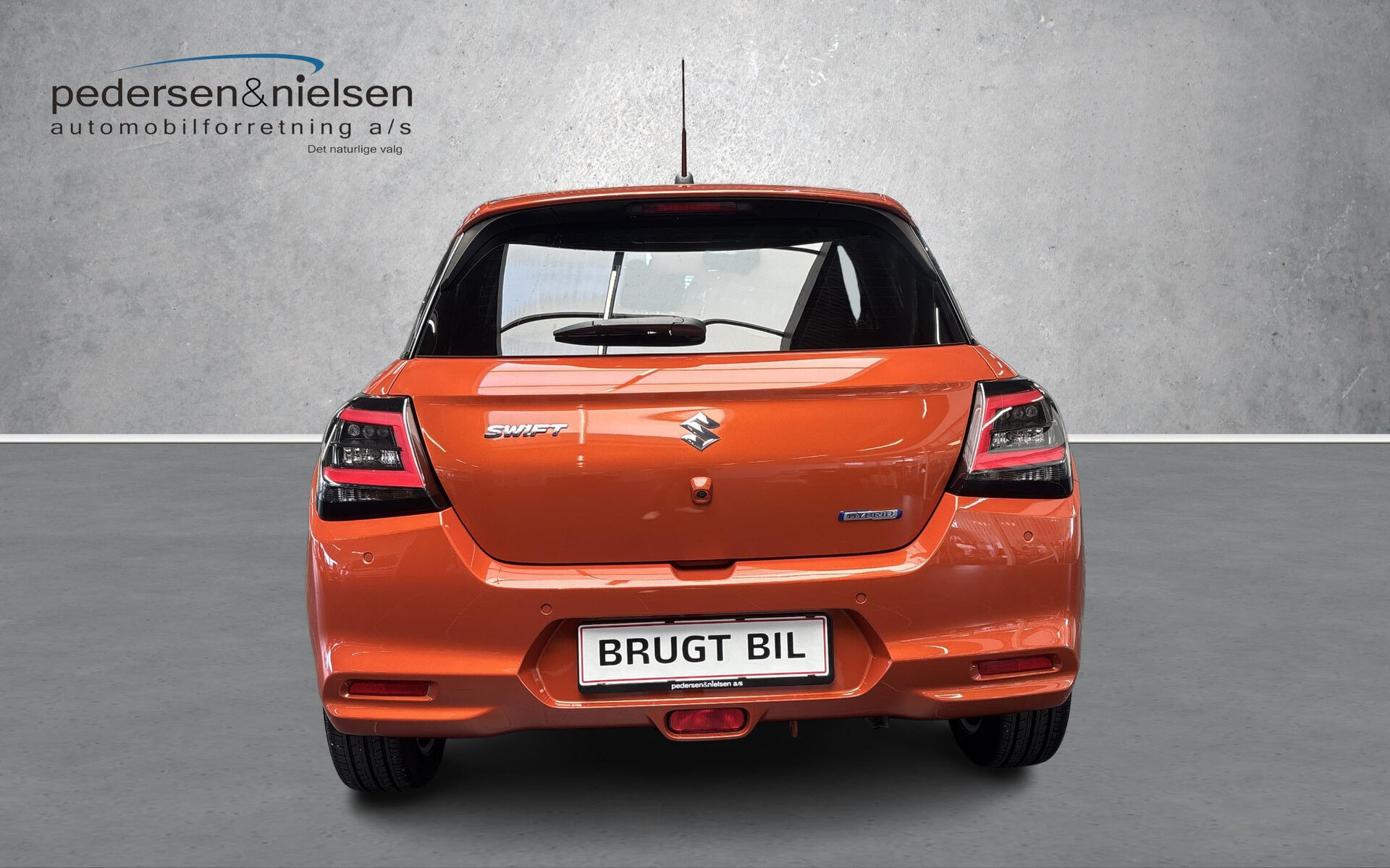 Orange Suzuki Swift fra 2024