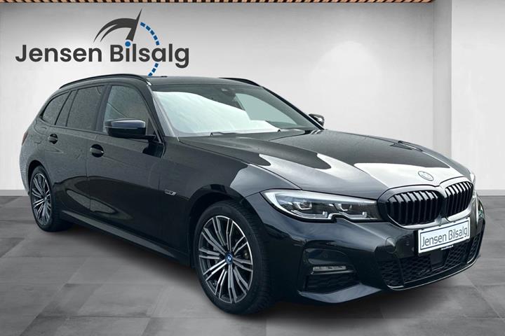 Grøn BMW 330e fra 2022