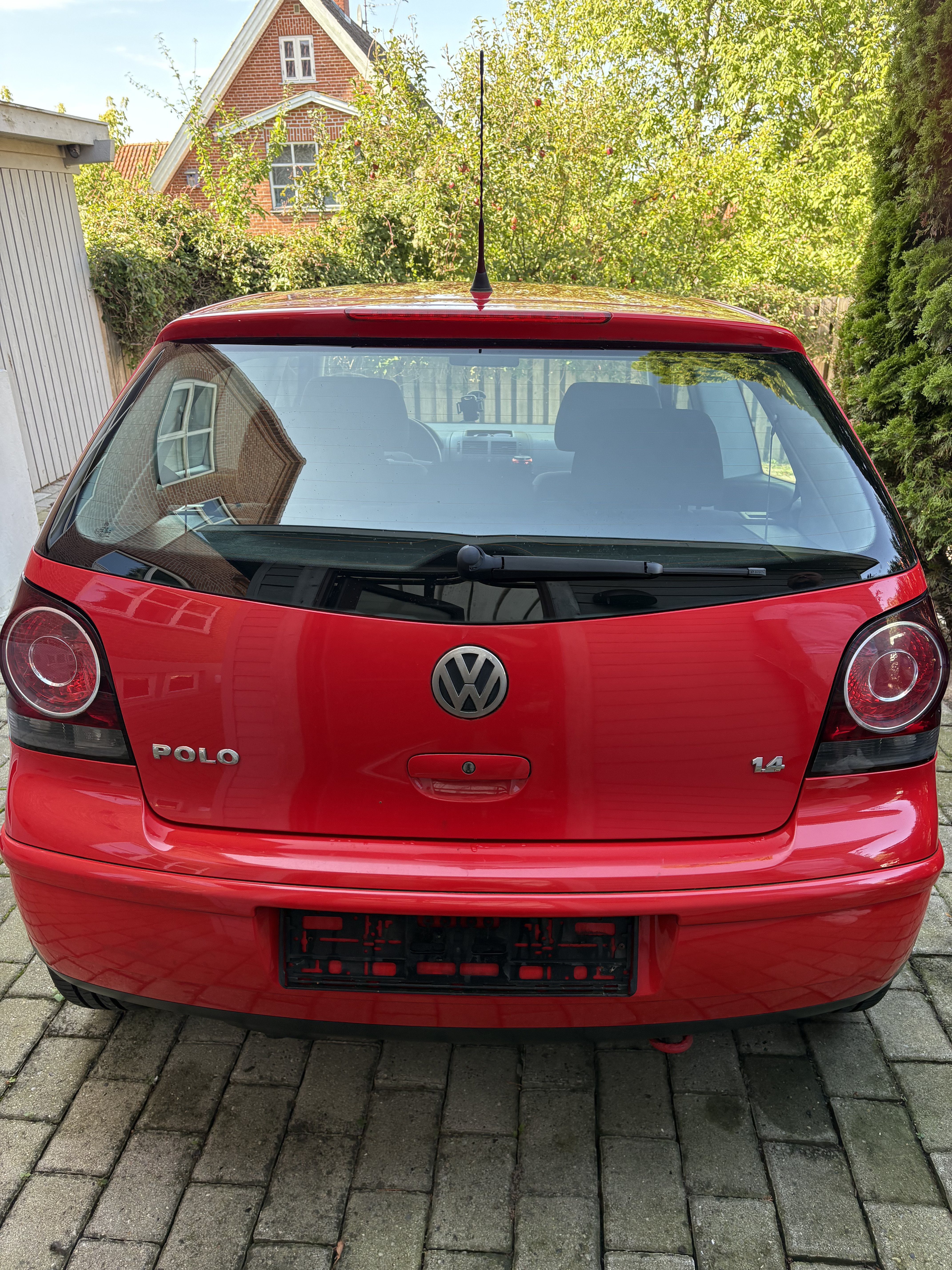 Rød VW Polo fra 2006