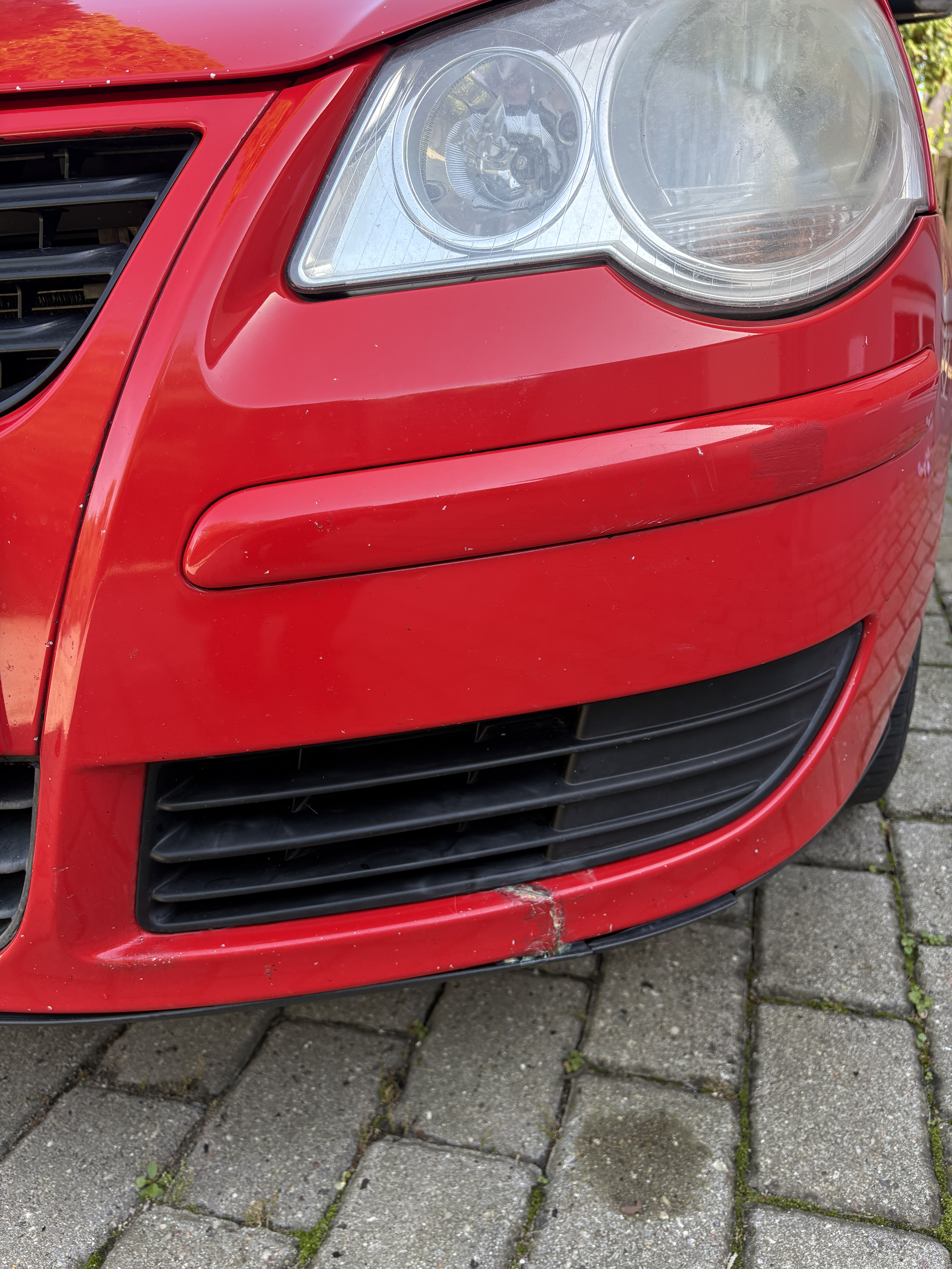 Rød VW Polo fra 2006