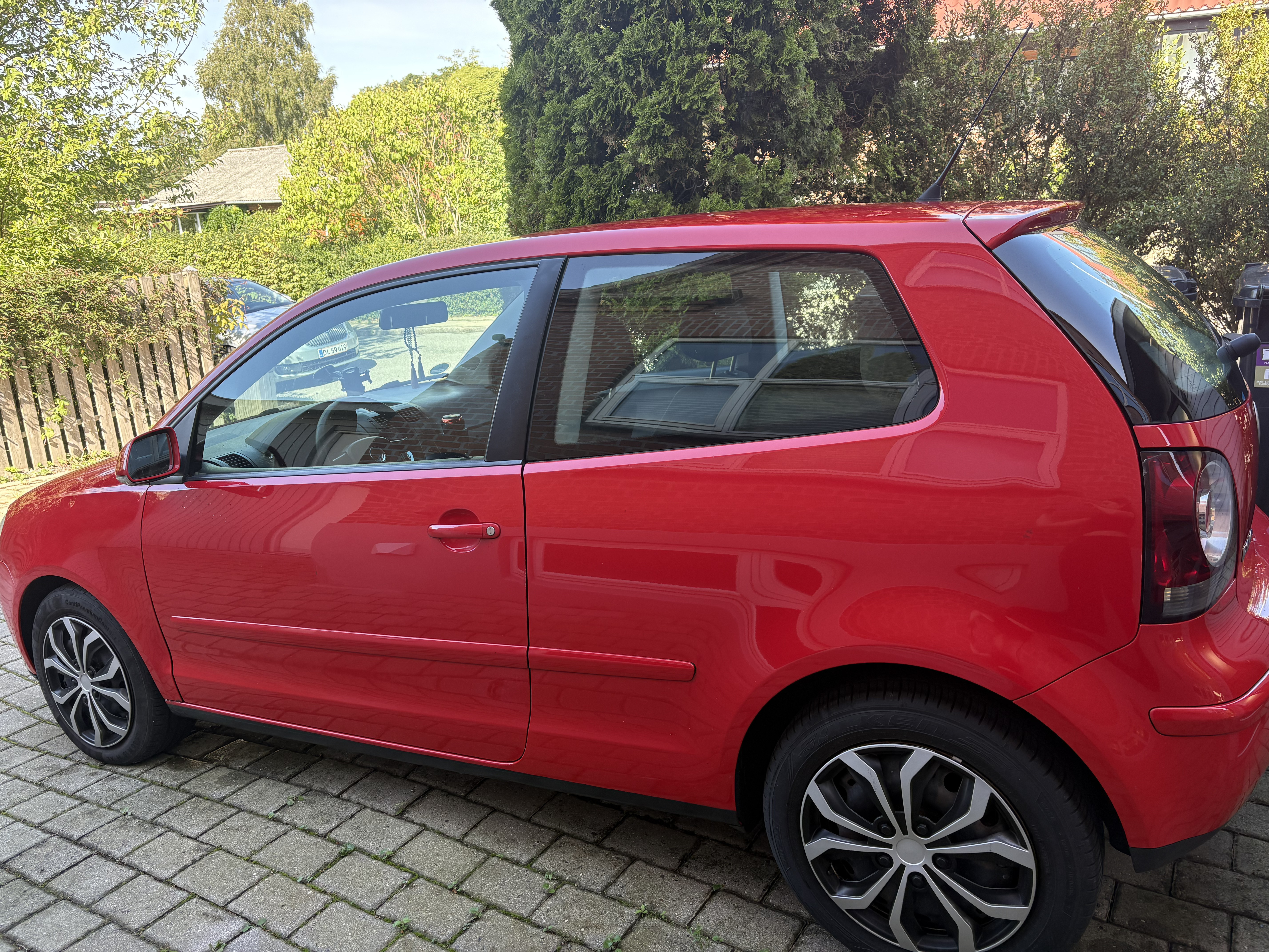 Rød VW Polo fra 2006